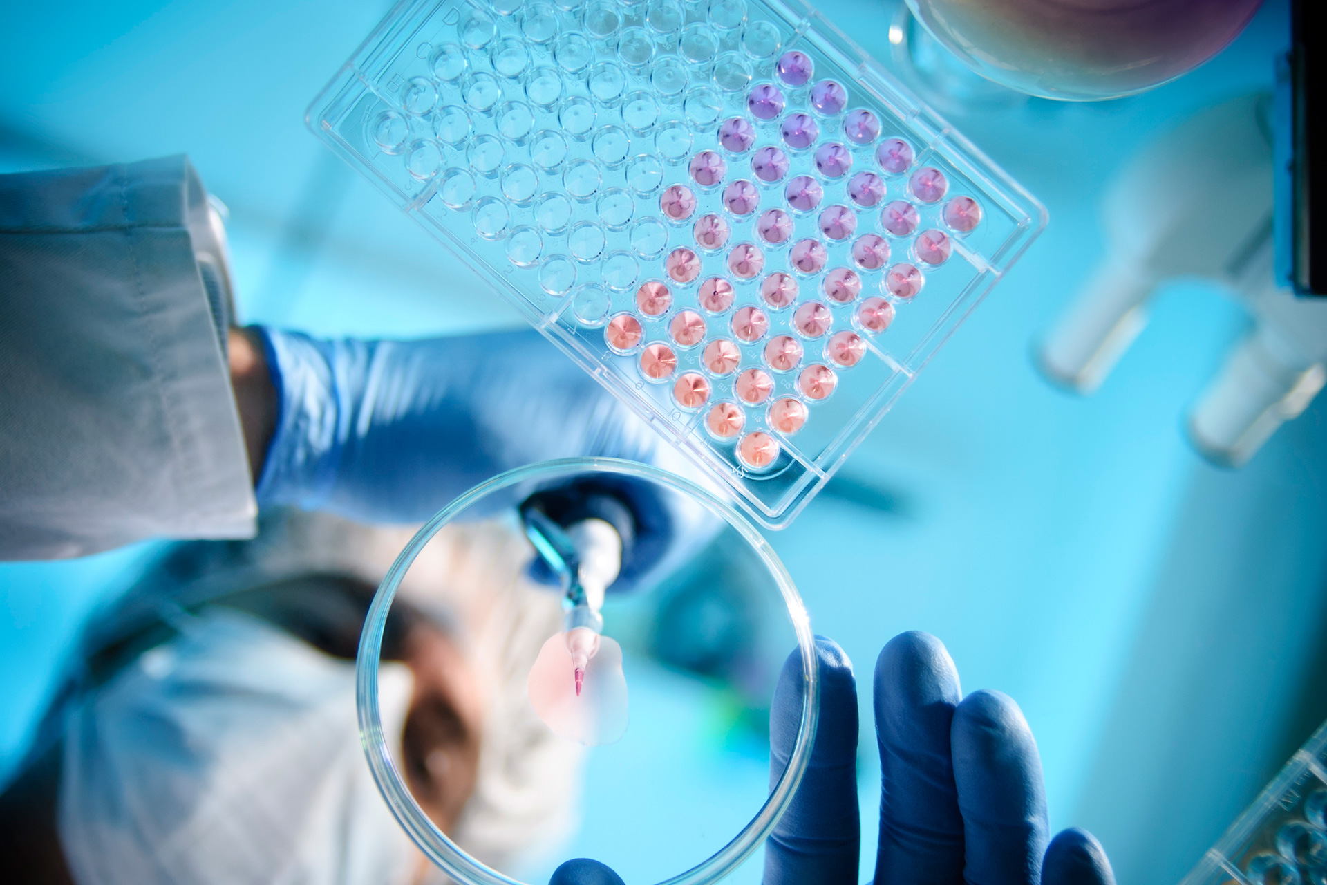 scientist working in a lab with a substance